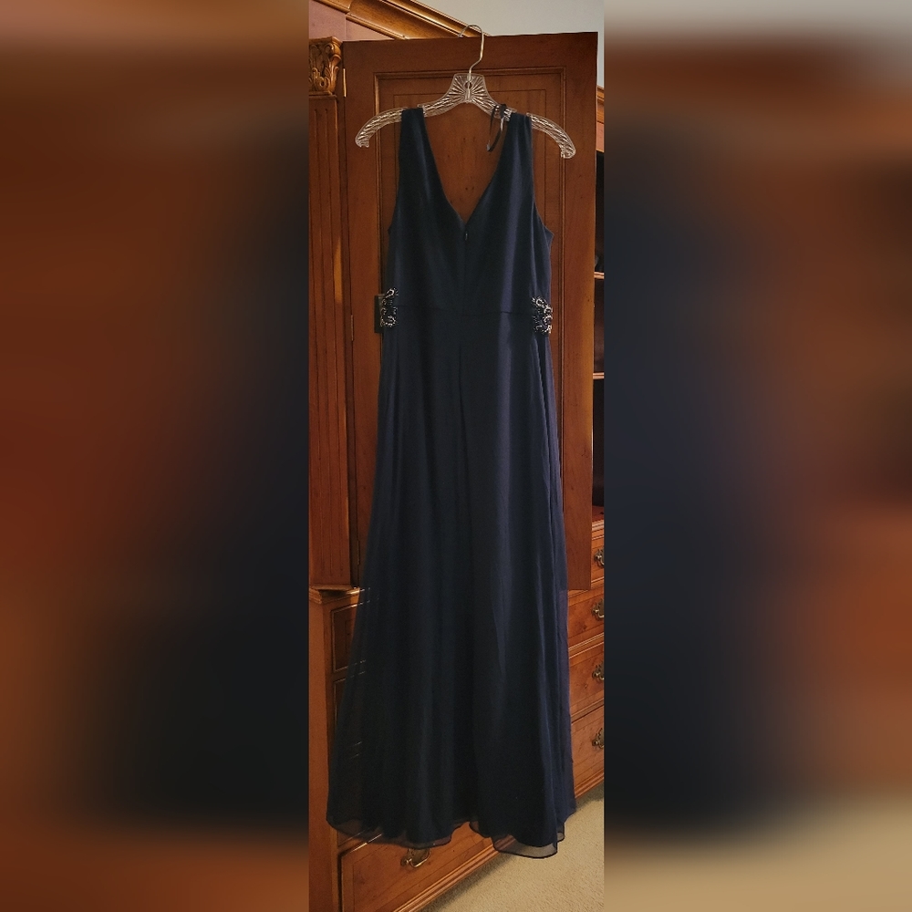 Beautiful Navy Marina floor length gown with beaded, sewn-on belt. Size 8. NWT